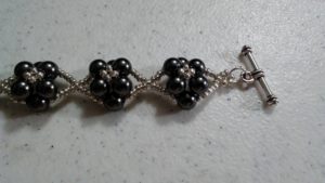 Bar toggled end of pearl cluster bracelet